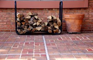 stack of firewood against home